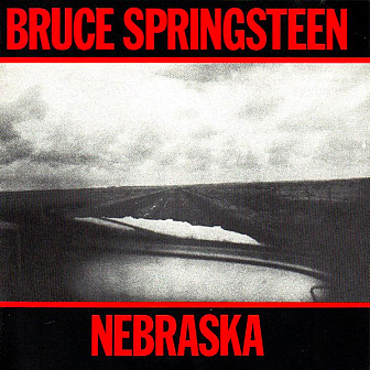 The Nebraska album cover; the location of the photo is unknown, but it was taken through the window of an old pickup truck in 1975