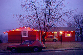 Peoria at Christmastime, 1975, when the events of Dan Fogelberg's "Same Old Lang Syne" took place. That's a 1974 Gremlin and a 1973 Volkswagen Beetle.  <br>Photo: <a href="https://www.flickr.com/photos/24736216@N07/4182131657/" target="_blank">Roger W</a>, via Flickr, CC 2.0